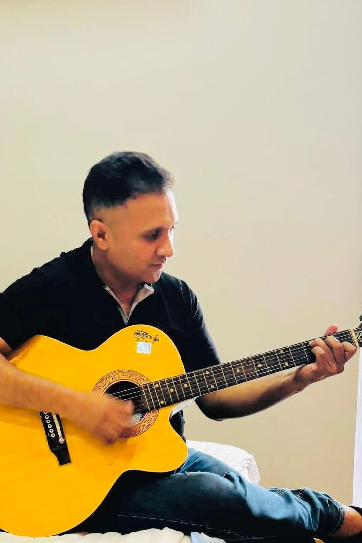 Playing Guitar — Personal Moment